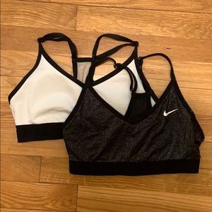 Small Nike and small VS Pink sports bra